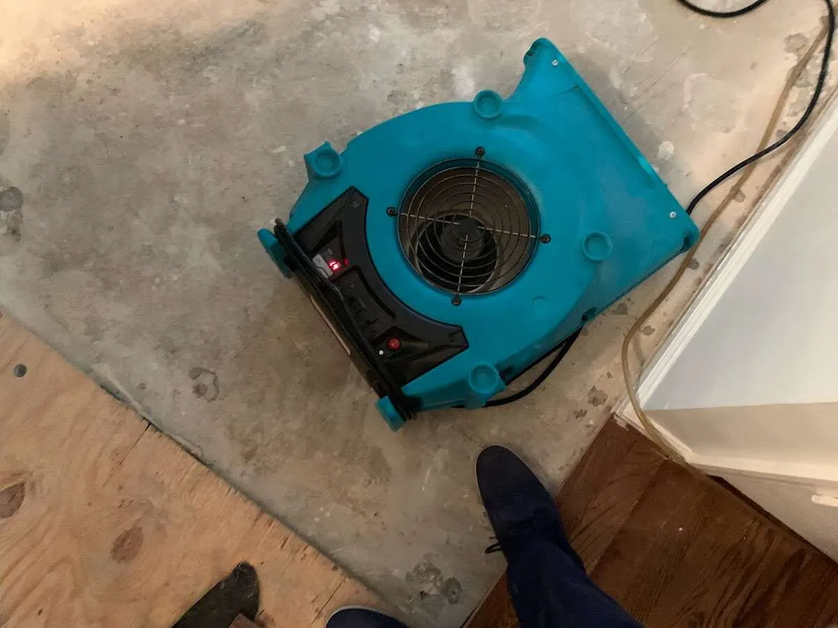 Air mover drying subfloor during Leak Detection & Repair in Dacono