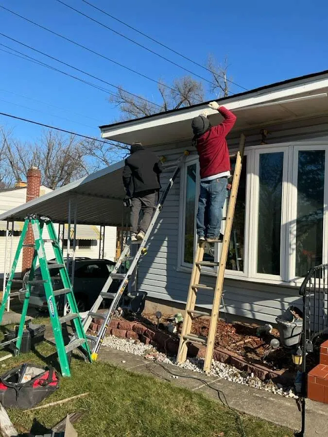 Restoration crew performing exterior repair in Dacono